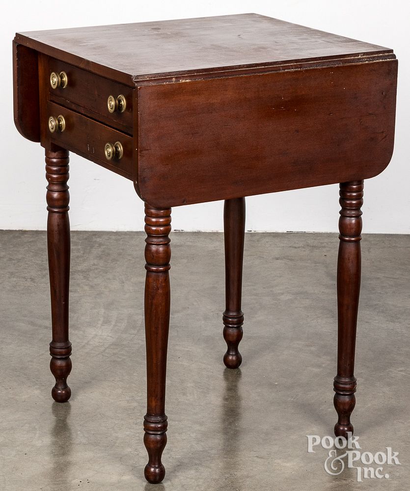 Appraisal: Pennsylvania cherry two-drawer drop-leaf stand Pennsylvania Sheraton cherry two-drawer drop-leaf