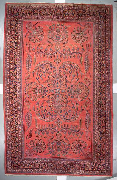 Appraisal: A Sarouk carpet size approximately ft in x ft in