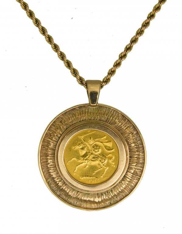 Appraisal: A GOLD COIN PENDANT mounted with an Isle of Man