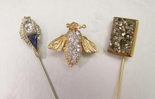 Appraisal: THREE GOLD PINS INCLUDING DIAMOND BEE K stick pin with