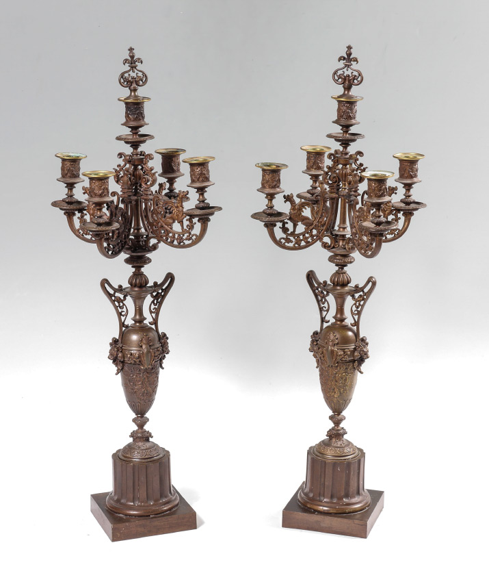 Appraisal: PAIR FIGURAL GRIFFIN CANDELABRA light patinated cast metal candelabra each