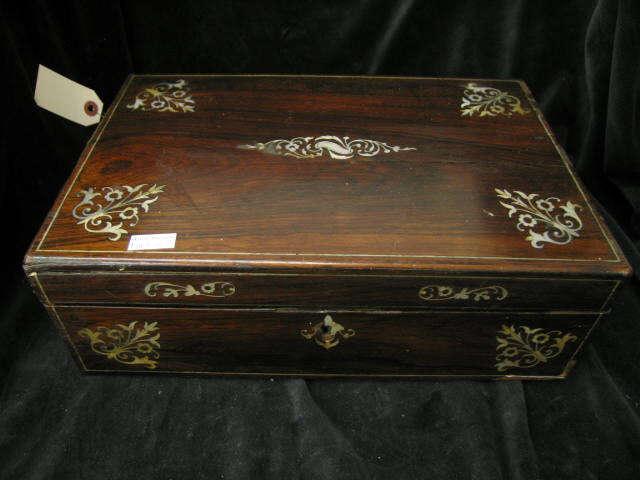 Appraisal: Victorian Rosewood Lap Desk inlaid mother-of-pearl interior compartments inkwell more