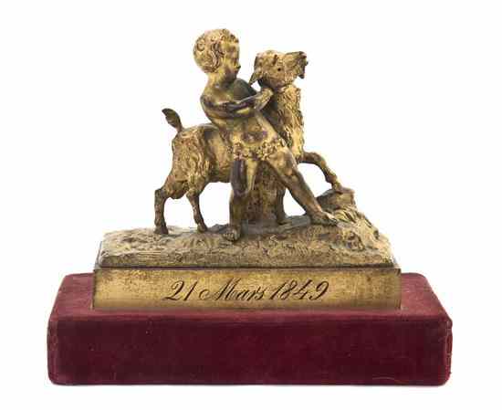 Appraisal: A French Gilt Metal Figural Group depicting a youth with