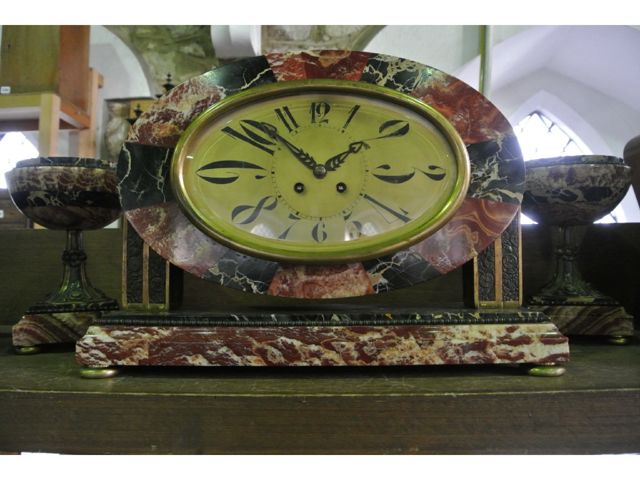 Appraisal: A good quality Art Deco clock garniture the clock dial