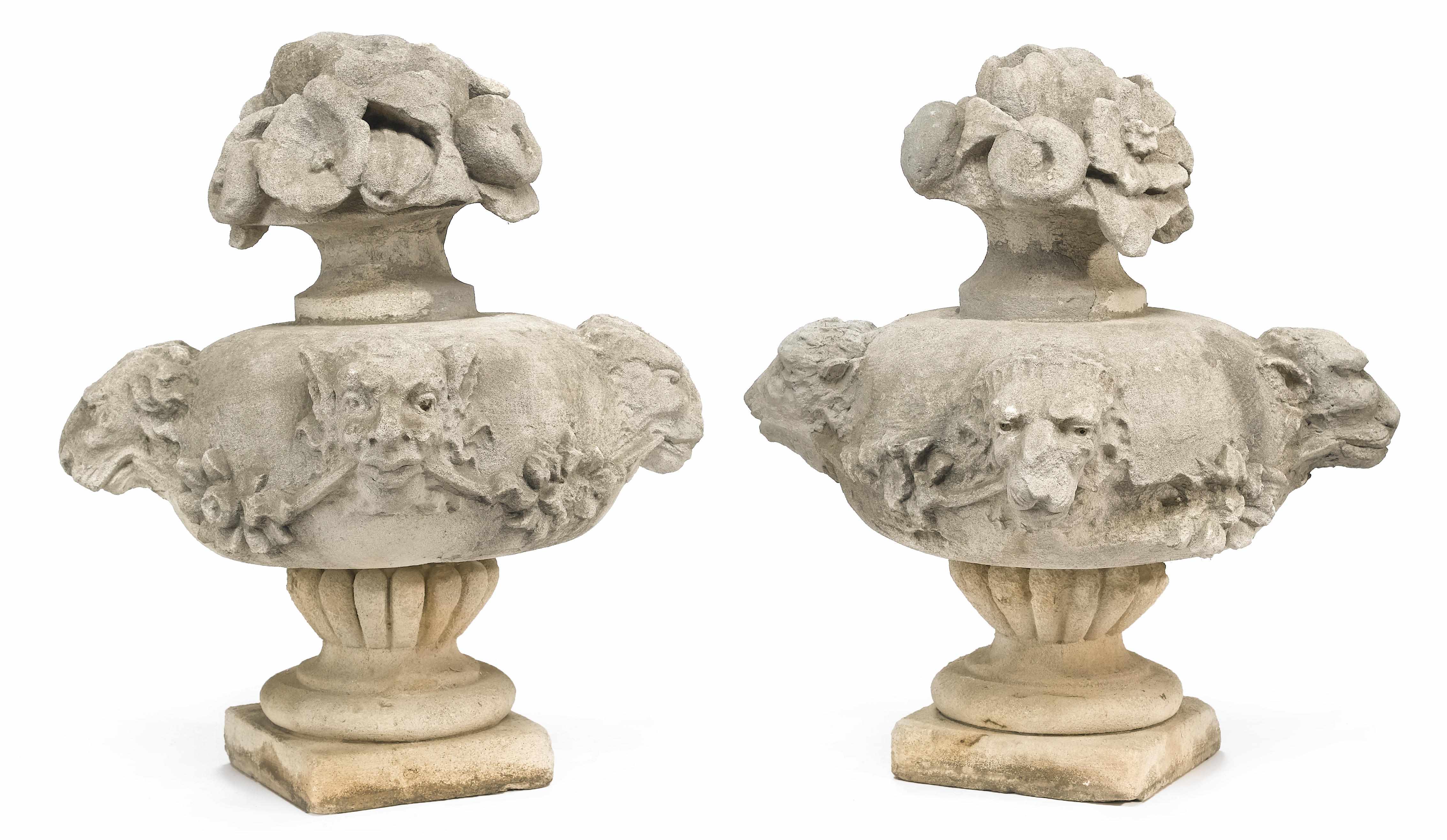 Appraisal: A pair of Baroque style carved stone finials th century