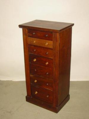 Appraisal: A VICTORIAN ROSEWOOD WELLINGTON CHEST with moulded edged top seven