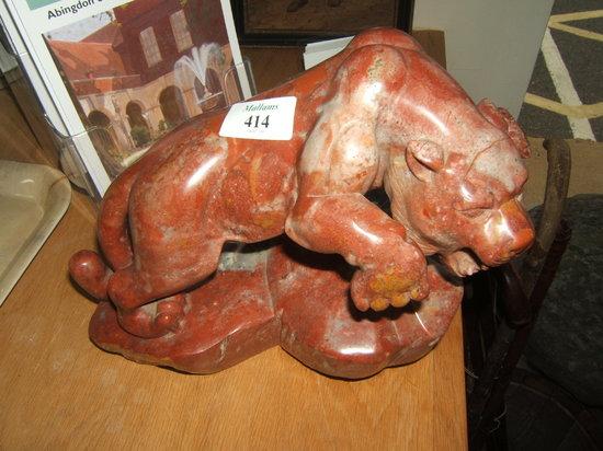 Appraisal: An Indian carved soapstone sculpture of a leaping tiger high