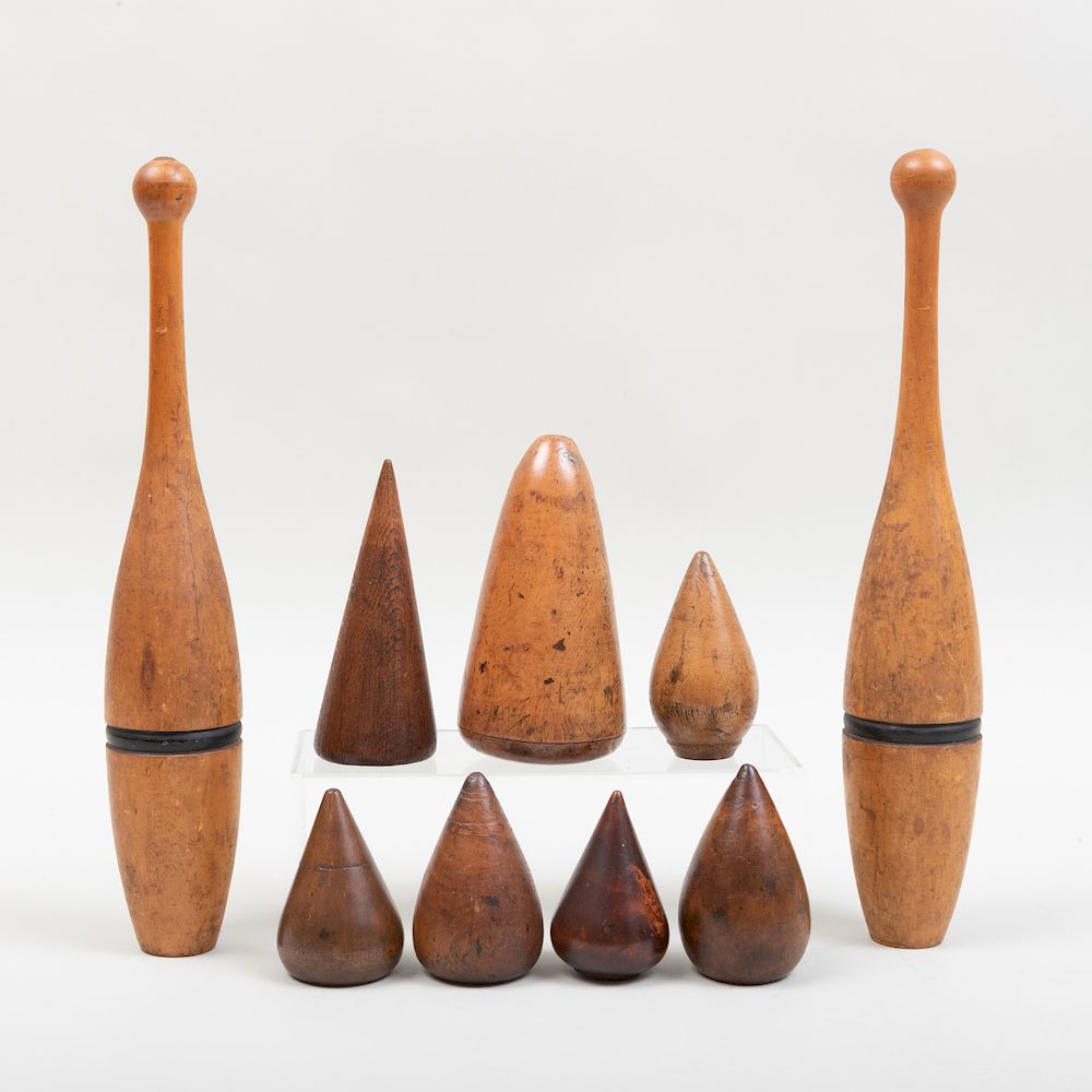 Appraisal: Group of Seven Wood Conical Turnpins and a Pair of