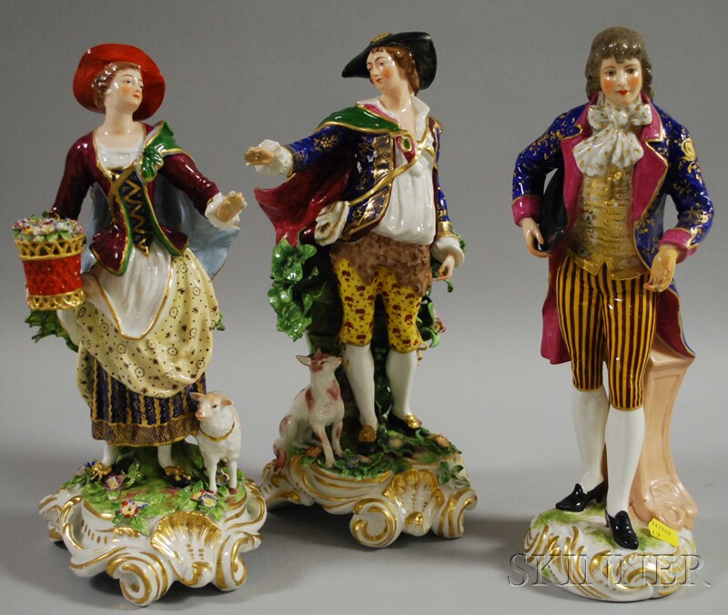 Appraisal: Three Hand-painted Paris Porcelain Figures a pastoral couple with applied