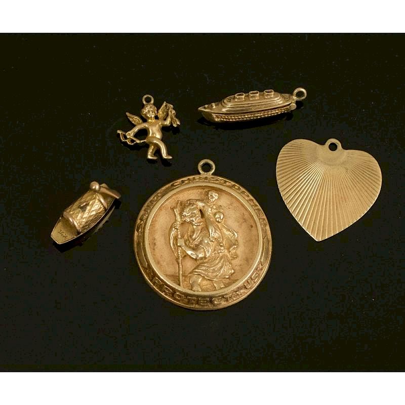 Appraisal: Five K Gold Charms Lot comprising five assorted K gold