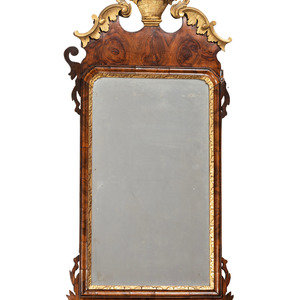 Appraisal: A George III Parcel Gilt and Carved Mahogany Mirror Circa