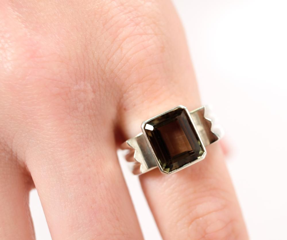 Appraisal: Sterling silver ring set with a x mm Smoky Quartz