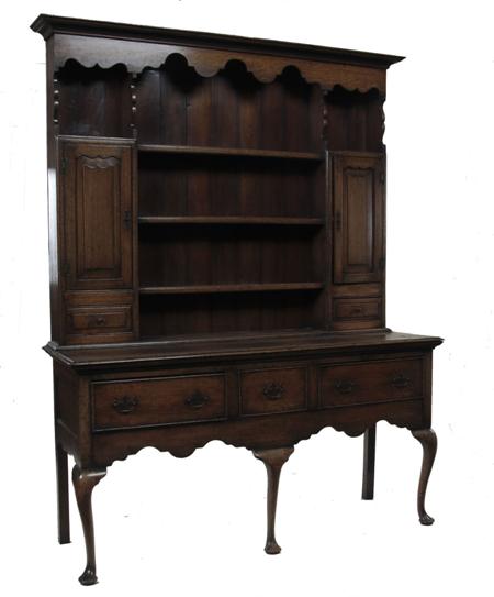 Appraisal: A George III style oak dresser the projected moulded cornice