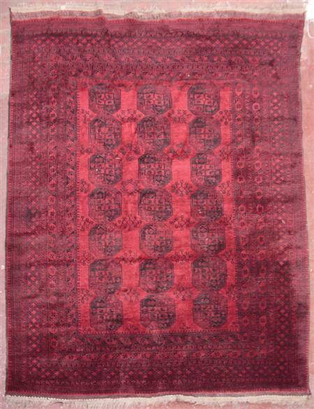 Appraisal: A Turkoman carpet early th century the red field with