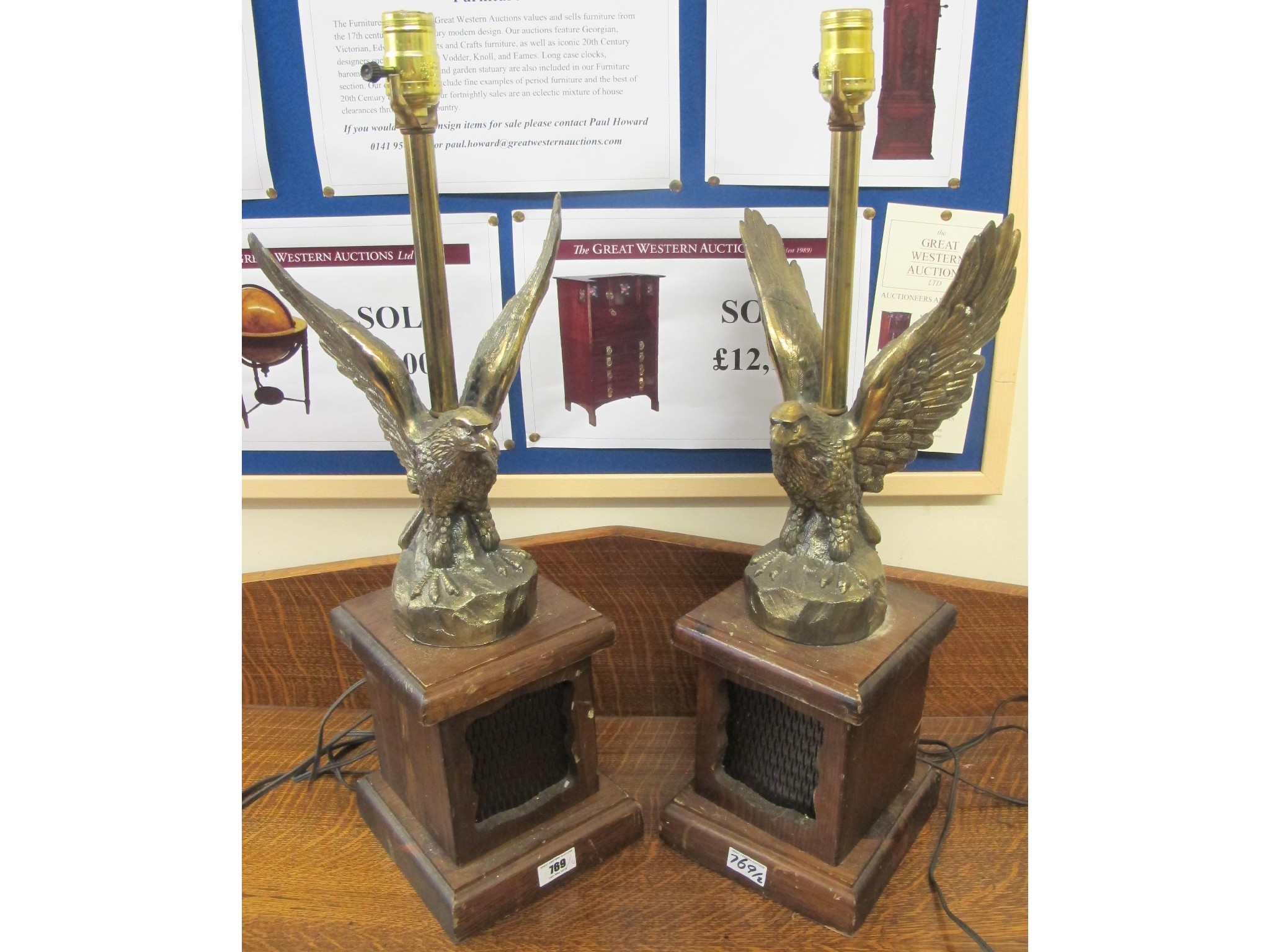 Appraisal: A pair of brass eagle table lamps