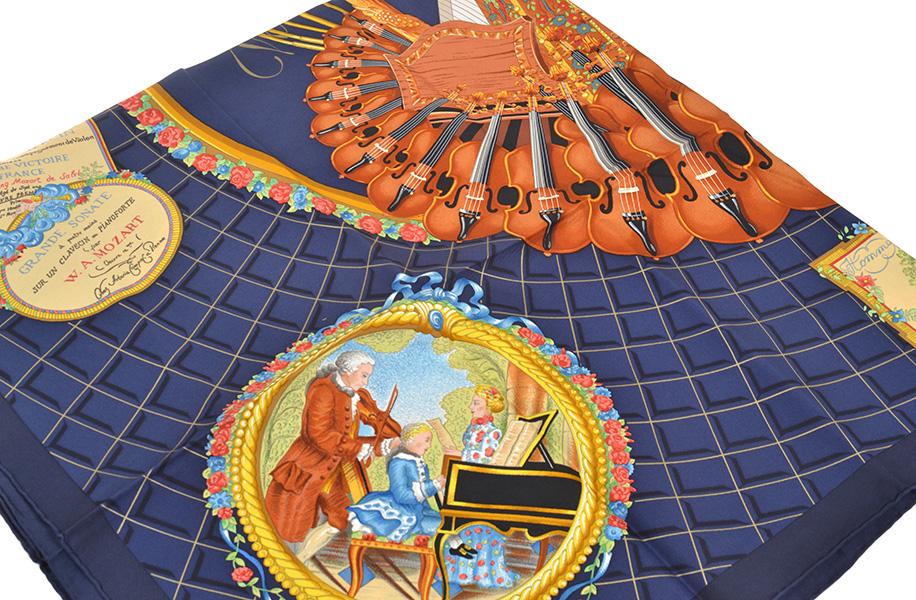 Appraisal: A SILK SCARF BY HERMES 'Wolfang Amadeus Mozart' design portraying