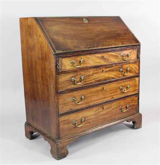 Appraisal: A George III mahogany bureau with fall over three graduated