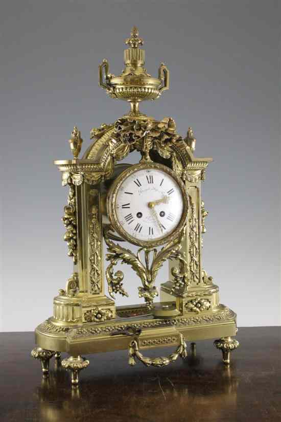 Appraisal: A th century French gilt brass mantel clock with ornate