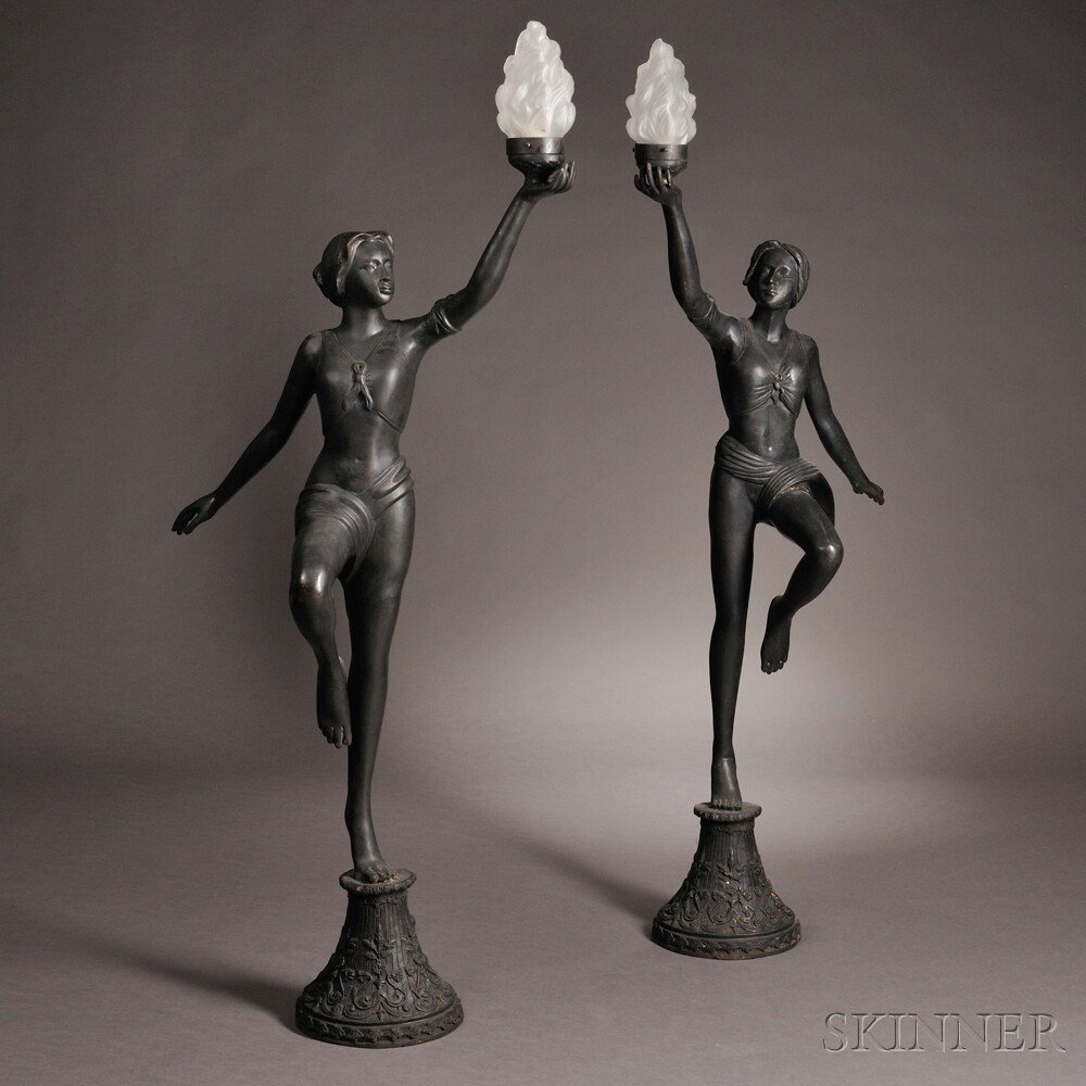 Appraisal: Pair of Patinated Bronze Garden Lamps th century each posed