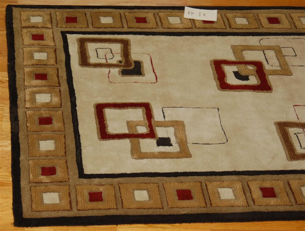 Appraisal: CONTEMPORARY WOOL RUG having a geometric design of asymmetrical squares