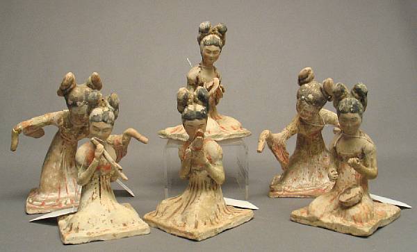 Appraisal: A group of six Tang style painted pottery models of