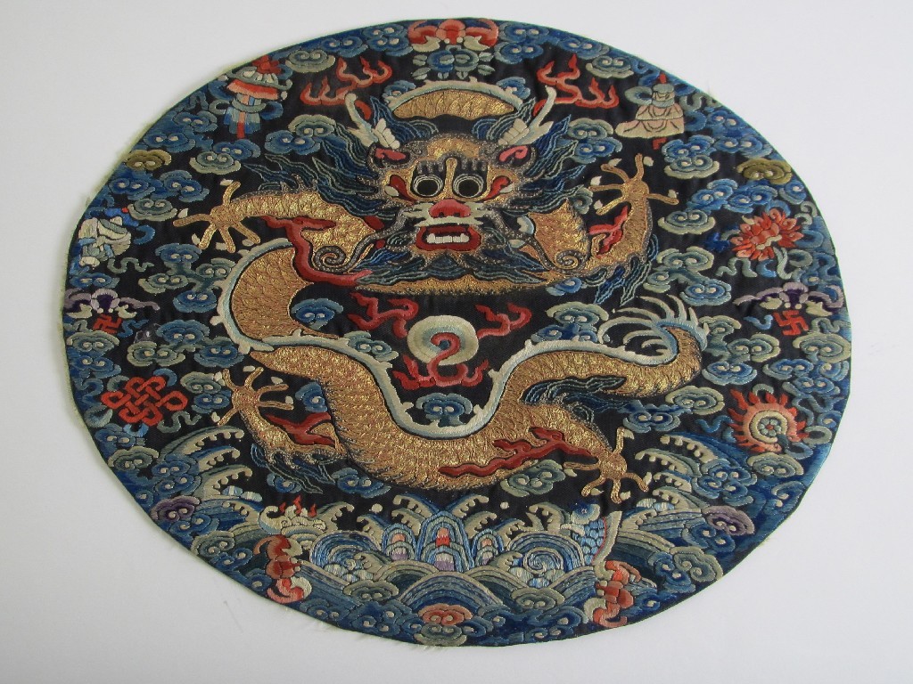 Appraisal: An Imperial dragon roundel from Chao Fu front facing five