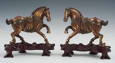 Appraisal: A Pair of Carved Ivory or Bone Horses on Carved