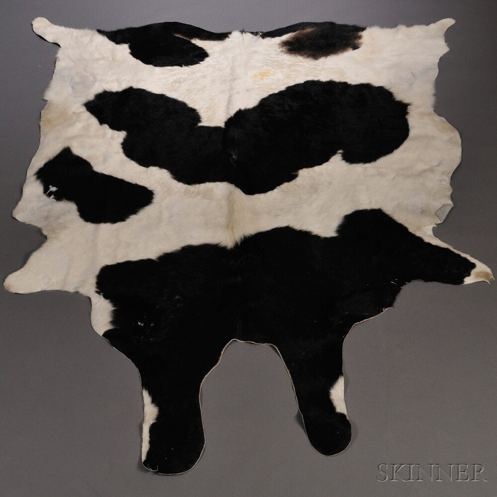 Appraisal: Cowhide Rug th century Black and white pattern some areas