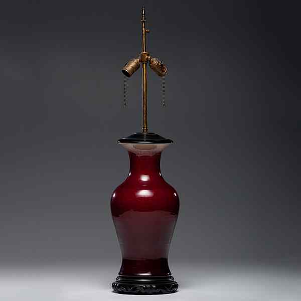 Appraisal: Chinese Flambe Lamp Chinese A porcelain vase in flambe glaze