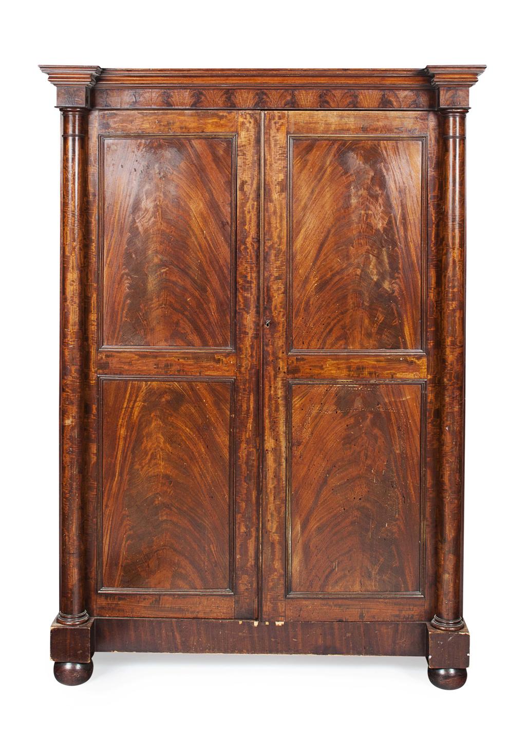 Appraisal: WILLIAM IV MAHOGANY WARDROBE CIRCA the inverted breakfront moulded cornice