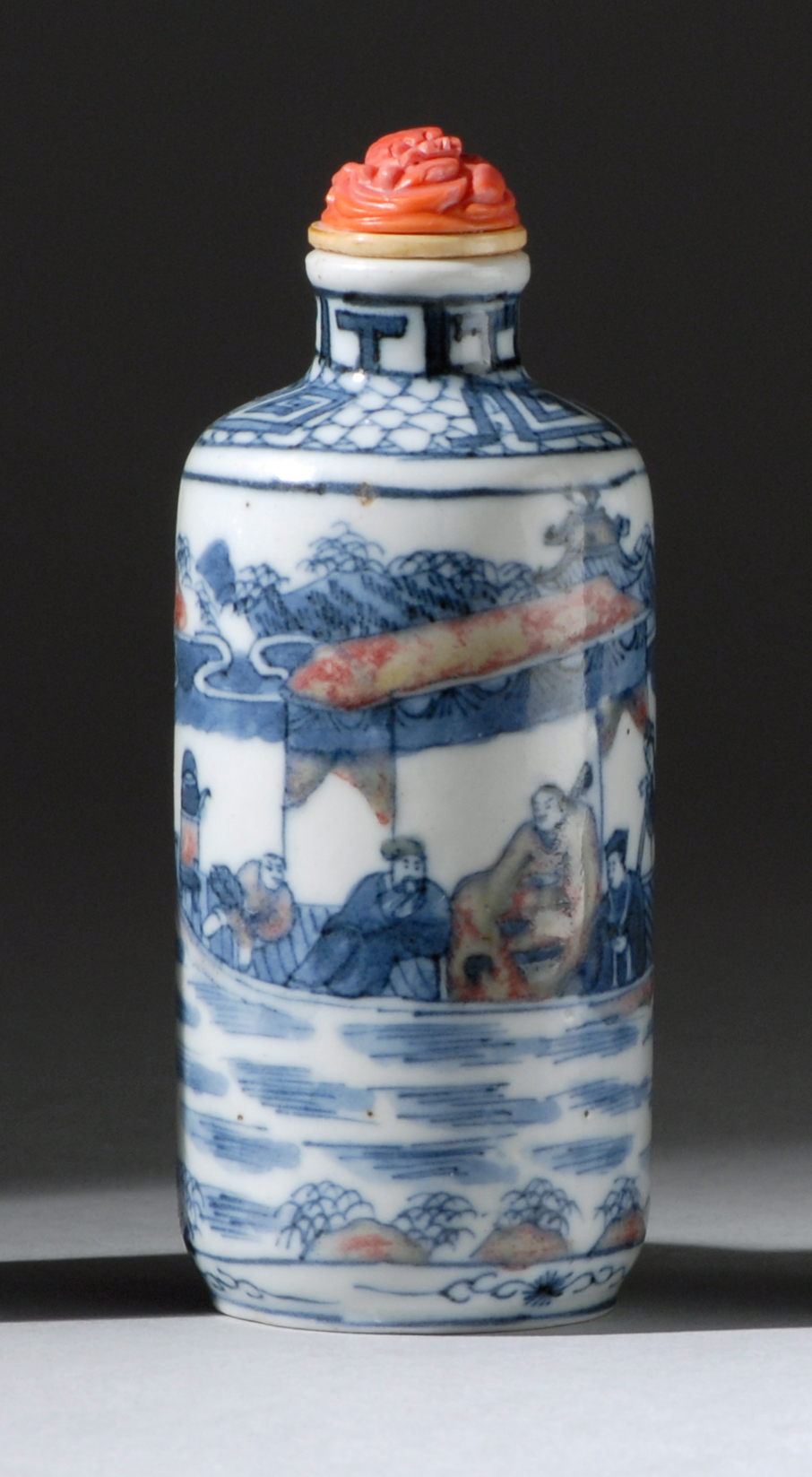 Appraisal: UNDERGLAZE RED AND BLUE PORCELAIN SNUFF BOTTLE Early th CenturyIn