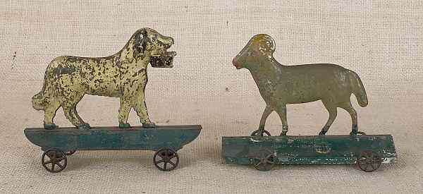 Appraisal: Two painted tin pull toys early th c to include