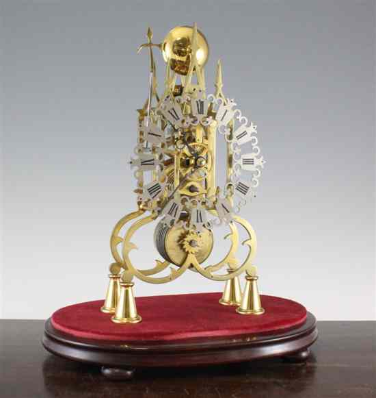 Appraisal: A Victorian single fusee skeleton clock with architectural frame and