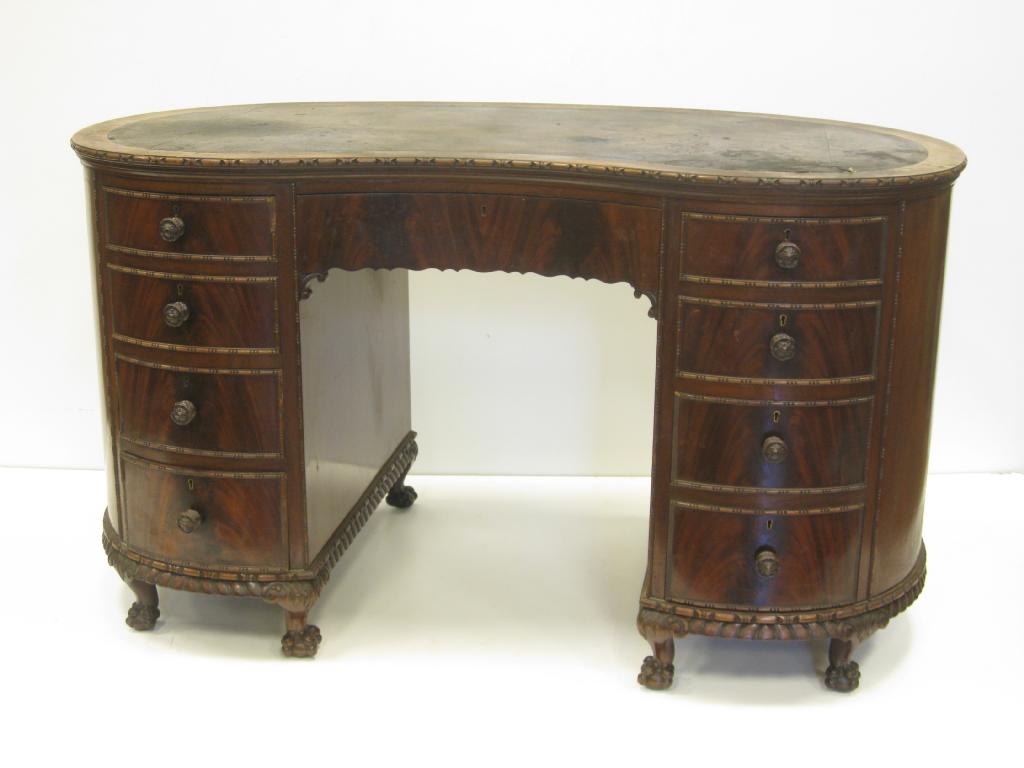 Appraisal: An early th Century mahogany kidney shape Kneehole Desk with