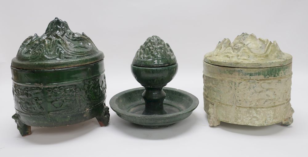 Appraisal: Three Han Boshan Vessels Two mingqi boshan lidded tripod containers