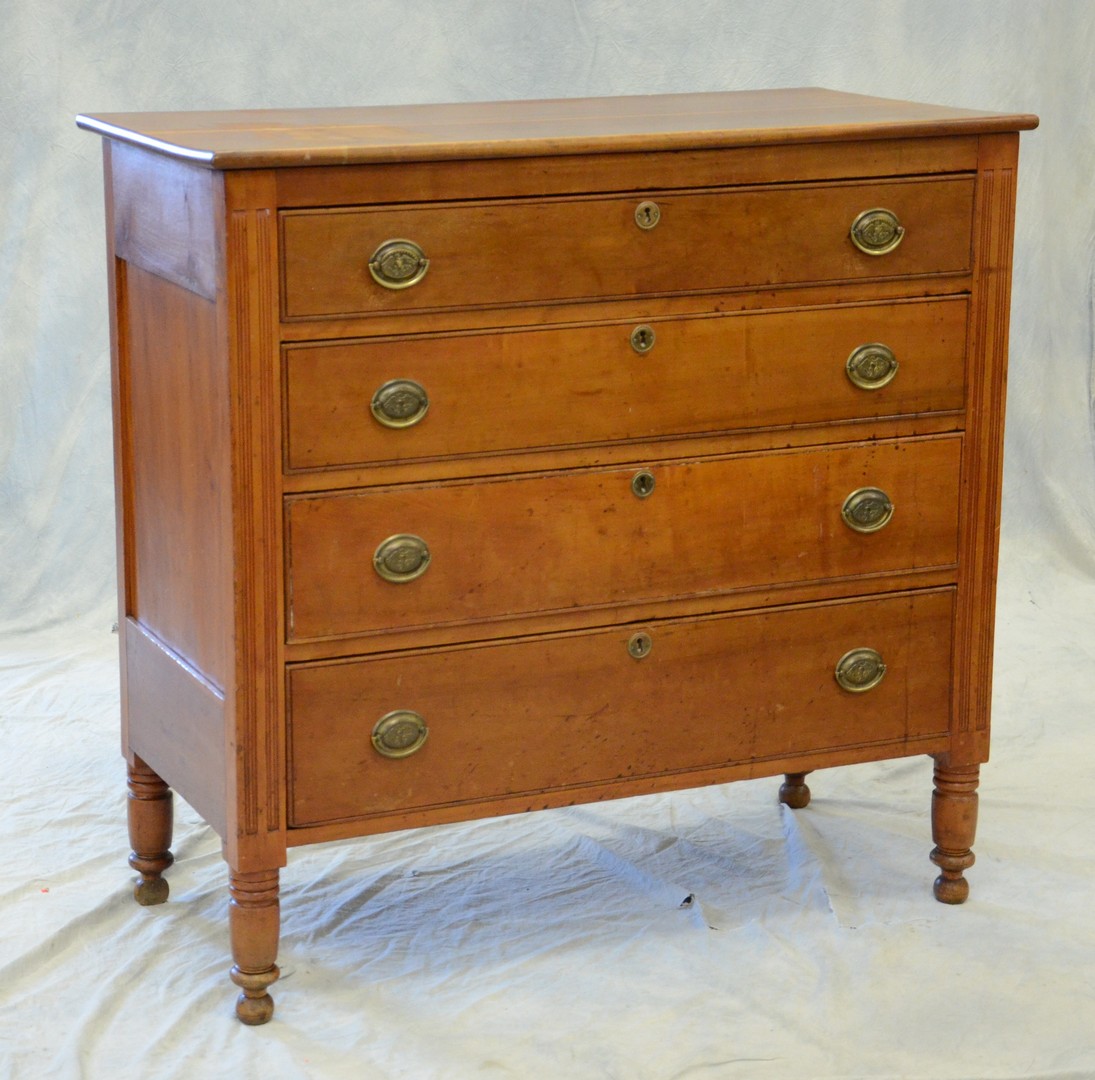 Appraisal: Sheraton cherry drawer bureau paneled ends reeded stiles flanking beaded