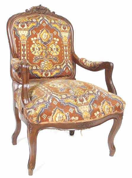 Appraisal: A pair of Louis XV style carved and upholstered fauteuil