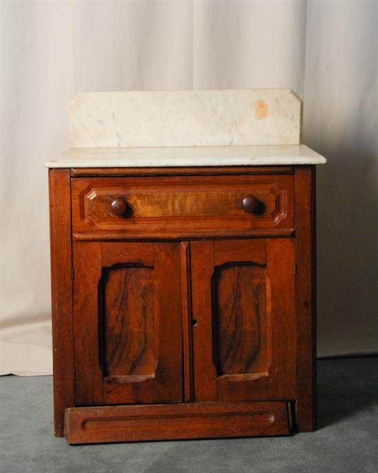 Appraisal: A Victorian Walnut Marble-top Washstand having a single drawer over