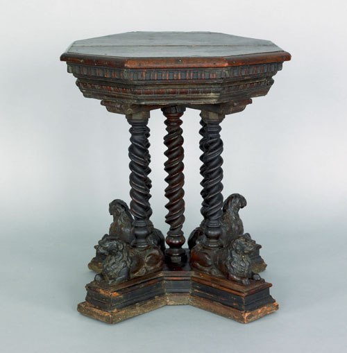 Appraisal: Italian carved walnut low table ca the octagonal top supported