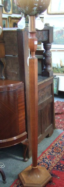 Appraisal: Four various th century oak and mahogany standard lamps