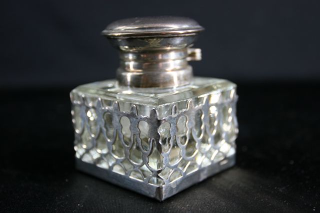 Appraisal: A silver mounted cut glass inkwell