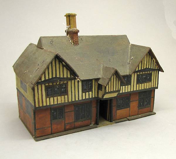 Appraisal: A folk art painted wood model of a Tudor home