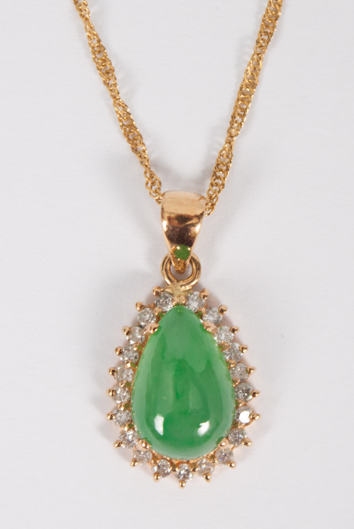 Appraisal: Lady's K gold jade diamond necklace containing one pear-shaped jade