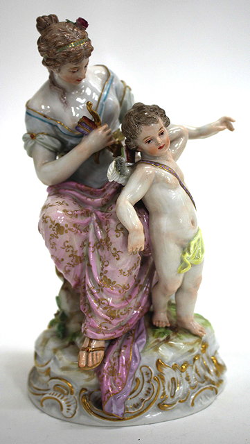 Appraisal: A MEISSEN PORCELAIN FIGURAL GROUP of a maiden and a