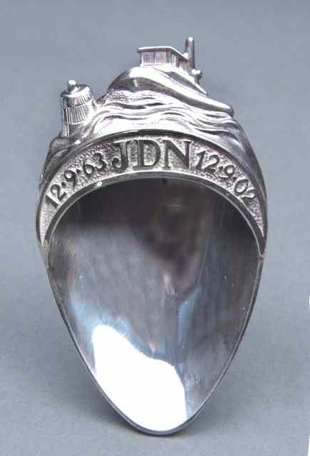 Appraisal: A BRITANNIA SILVER 'CAPTAIN JOHN NORIE' COMMEMORATIVE NAUTICAL CADDY SPOON