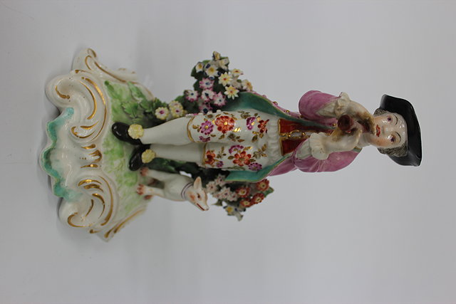 Appraisal: AN ANTIQUE SOFT PASTE PORCELAIN POSSIBLY DERBY FIGURE OF A