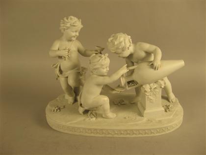 Appraisal: French bisque bacchic figure group Modeled as a group of