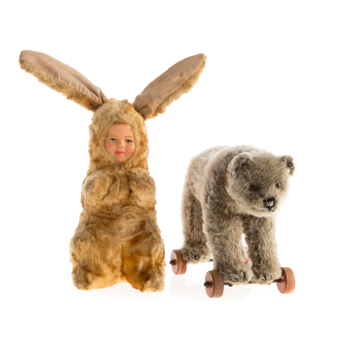 Appraisal: Steiff miniature bear on wheels and bunny doll including grey