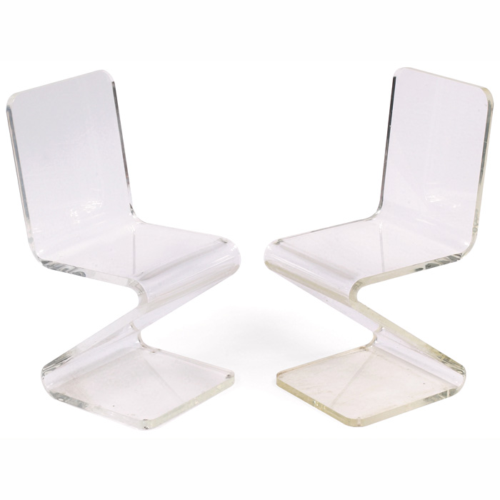 Appraisal: Lucite chairs pair each formed from a single piece of