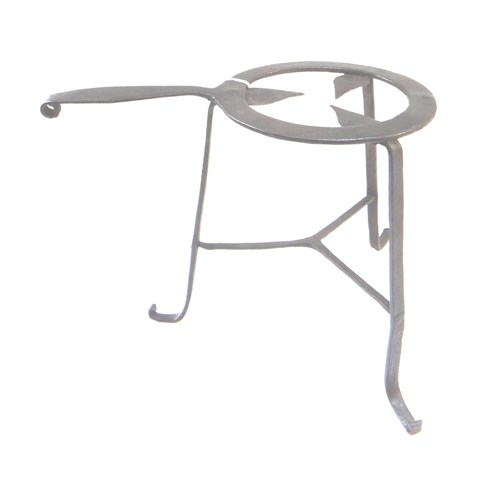 Appraisal: A wrought iron trivet th century the circular top with